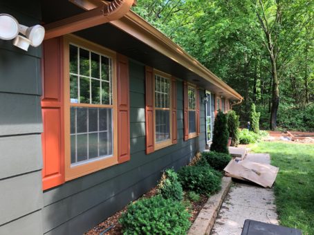 Shutters, gutters and house painted.